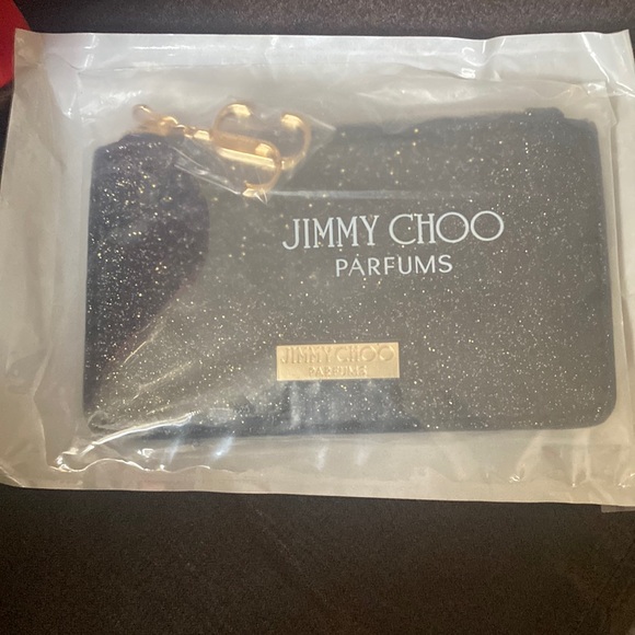 Jimmy Choo Handbags - New Jimmy Choo mini 1 zip wallet measurements 5 1/2 x3”